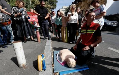 Activists protest to demand introduction of first aid courses in Romanian school Stock Photos