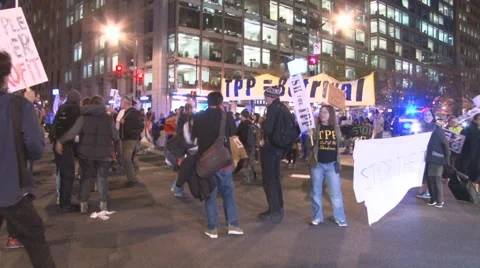 Activists protest the T.P.P. and block traffic in Washington.   Video stock 57979569