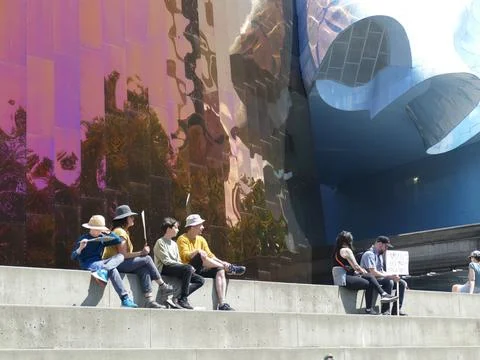Activists protesting in front of MoPOP, Museum of Pop Culture, Seattle, Was.. Stock Photos
