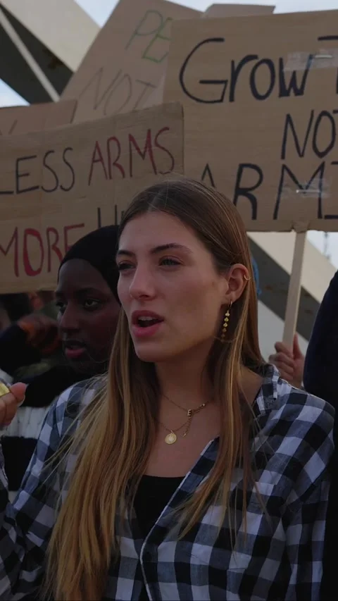 Activists protesting war and promoting peace Stock Footage 312235826