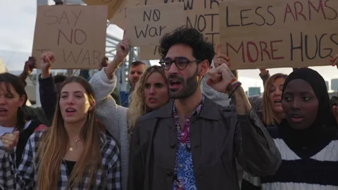 Activists protesting war and promoting peace Stock Footage 312236255