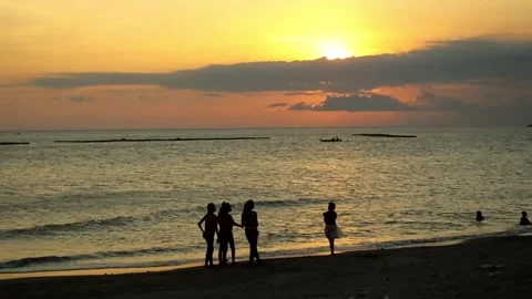Activities on the beach at sunset Stock Footage 151943352
