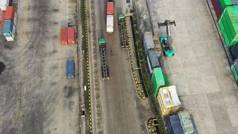 Activities at the Cargo Ship and Container Yard of Tanjung Priok Harbor Jakarta Stock Footage 218274394