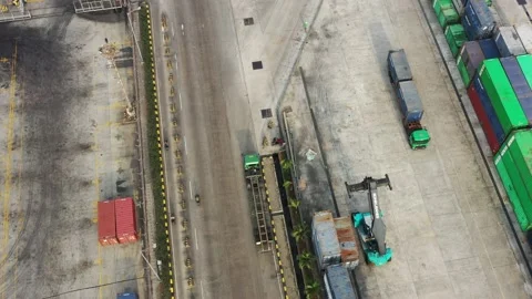 Activities at the Cargo Ship and Container Yard of Tanjung Priok Harbor Jakarta Stock Footage 218274653