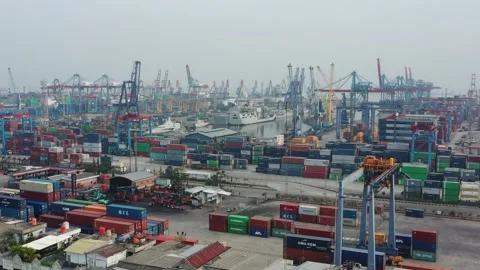 Activities at the Cargo Ship and Container Yard of Tanjung Priok Harbor Jakarta Stock Footage 218275703