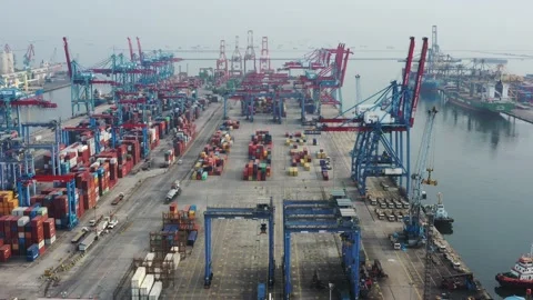 Activities at the Cargo Ship and Container Yard of Tanjung Priok Harbor Jakarta Stock Footage 218275933