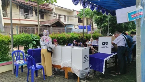 Activities inside a voting place during election day Stock Footage 264953138