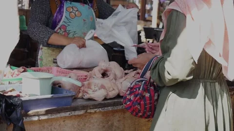 The activities of traders or sellers and buyers of broiler chickens in tradition Stock Footage 208302604
