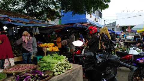 Activities in traditional markets between traders and buyers in Pelabuhanratu Stock Footage 236967819