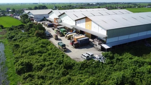 Activities in the warehouse area include loading industrial goods into tran.. Stock Footage 312215673
