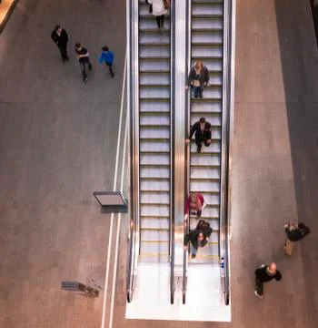 Activity on escalator in the station Stock Photos