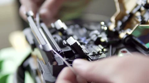 Activity for Fiber Optic Cable: Mechanical Splice Technology Industrial tool Stock Footage 78412433