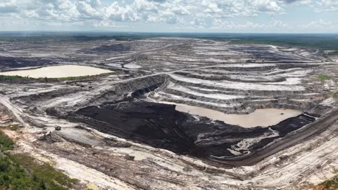 Activity of loading coal into transport trucks in the blackened coal mining.. Stock Footage 338313350