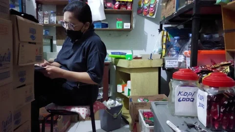 The activity of a masked mother Stock Footage 231883253