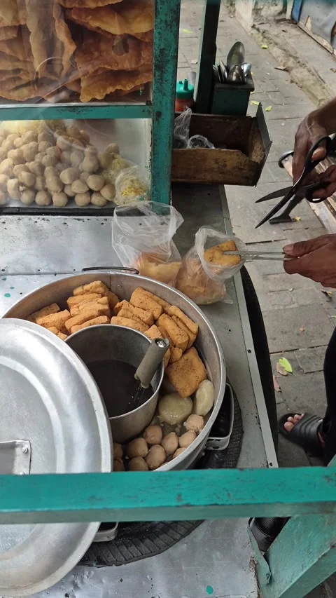 The activity of a meatball seller Stock Footage 324834511