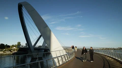 Activity on Perth's Elizabeth Quay Bridge on sunny day 6K Stock Footage 312186644