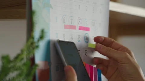 Activity planning on calendar Video stock 235718408