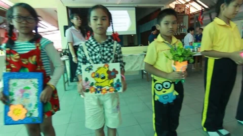Activity of primary school education. student present Paper Mache. Stock Footage 67401929