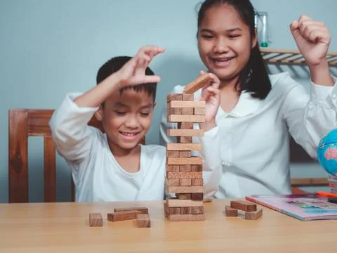 Activity relationship, Brain and concentration training games, Asian family.. Stock Photos
