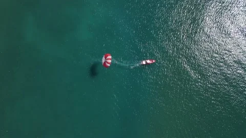 Activity at sea with a parachute attached to the boat 動画素材 164359096