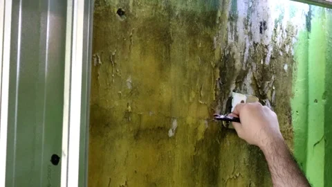 The activity of someone who is trying to remove the iron plate Stock Footage 241376342