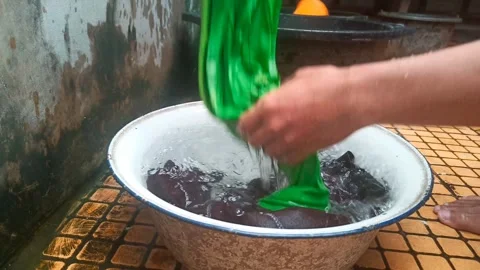 The activity of washing clothes manually using hands Stock Footage 281314790