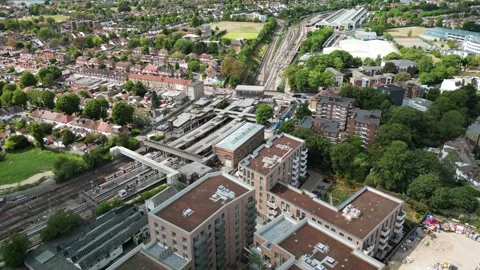 Acton Gardens redevelopment area and Acton Town Station in West London Stock Footage 261355283