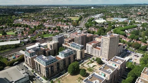 Acton Gardens redevelopment area and Acton Town Station in West London Stock Footage 261355296