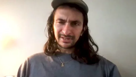 Actor Aneil Karia is interviewed online for his new movie, 'Surge' - 2021 Video stock 154347541