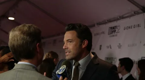 Actor Ben Affleck attends red carpet film premiere of Gone Girl Video stock 43260628