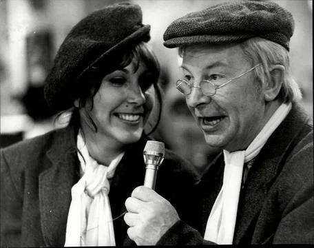 Actor Clive Dunn Singing His Song 'grandad' Watched By Actress Anita Harris. Photos