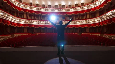 Actor communicates with empty theater auditorium.  Video stock 146600224