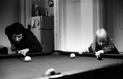 Actor Dustin Hoffman playing pool with his step daughter Karina., New York, USA Stock Photos