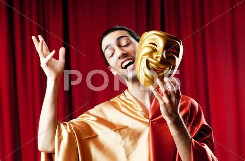 Actor with maks in a funny theater concept Stock Photos