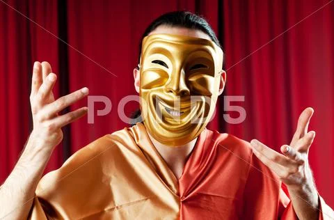 Actor with maks in a funny theater concept Stock Photos