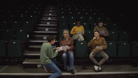 Actor Performing in front of Drama Teacher and Students in Theatre Stock Footage 279587052