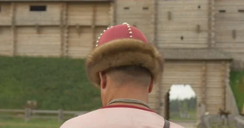 Actor in Pink Costune And Hat as Prince Vladimir the Great is Standing in Front Stock Footage 52220450