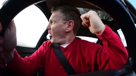 Actor playing road rage man in car Stock Footage 61325315