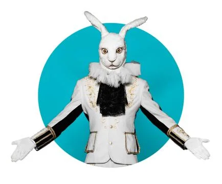 Actor posing in white rabbit suit on color  blue background.Studio shot Stock Photos