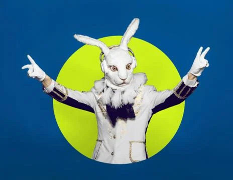 Actor posing in white rabbit suit on color green blue background.Studio shot Stock-Fotos