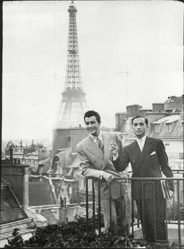 Actor Robert Taylor (left) In Sight Of The Eiffel Tower In Paris France Robert T Stock Photos