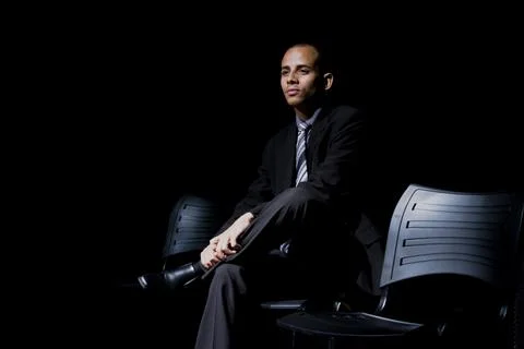 Actor on stage represents a dramatic character. Stock Photos