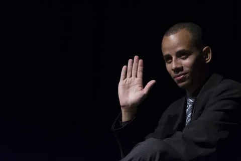 Actor on stage represents a dramatic character. Stock Photos