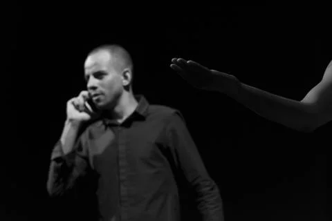 Actor on stage represents a dramatic character. Stock Photos