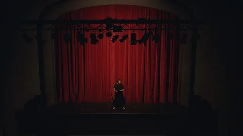 Actor in a theatre reviewing the script 스톡 동영상 108185520