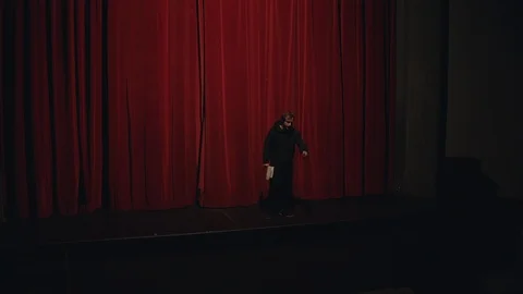 Actor in a theatre reviewing the script 스톡 동영상 108188041