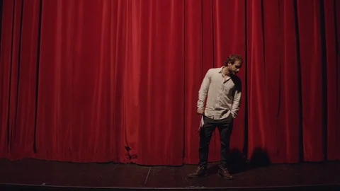 Actor in a theatre reviewing the script 스톡 동영상 108189859