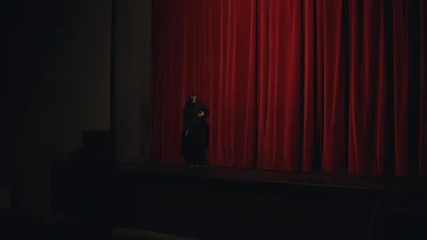 Actor in a theatre reviewing the script 스톡 동영상 108190141