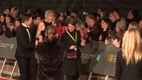 Actors and actresses walking down the red carpet at 72nd BAFTAs - 2019 Video stock 103670525