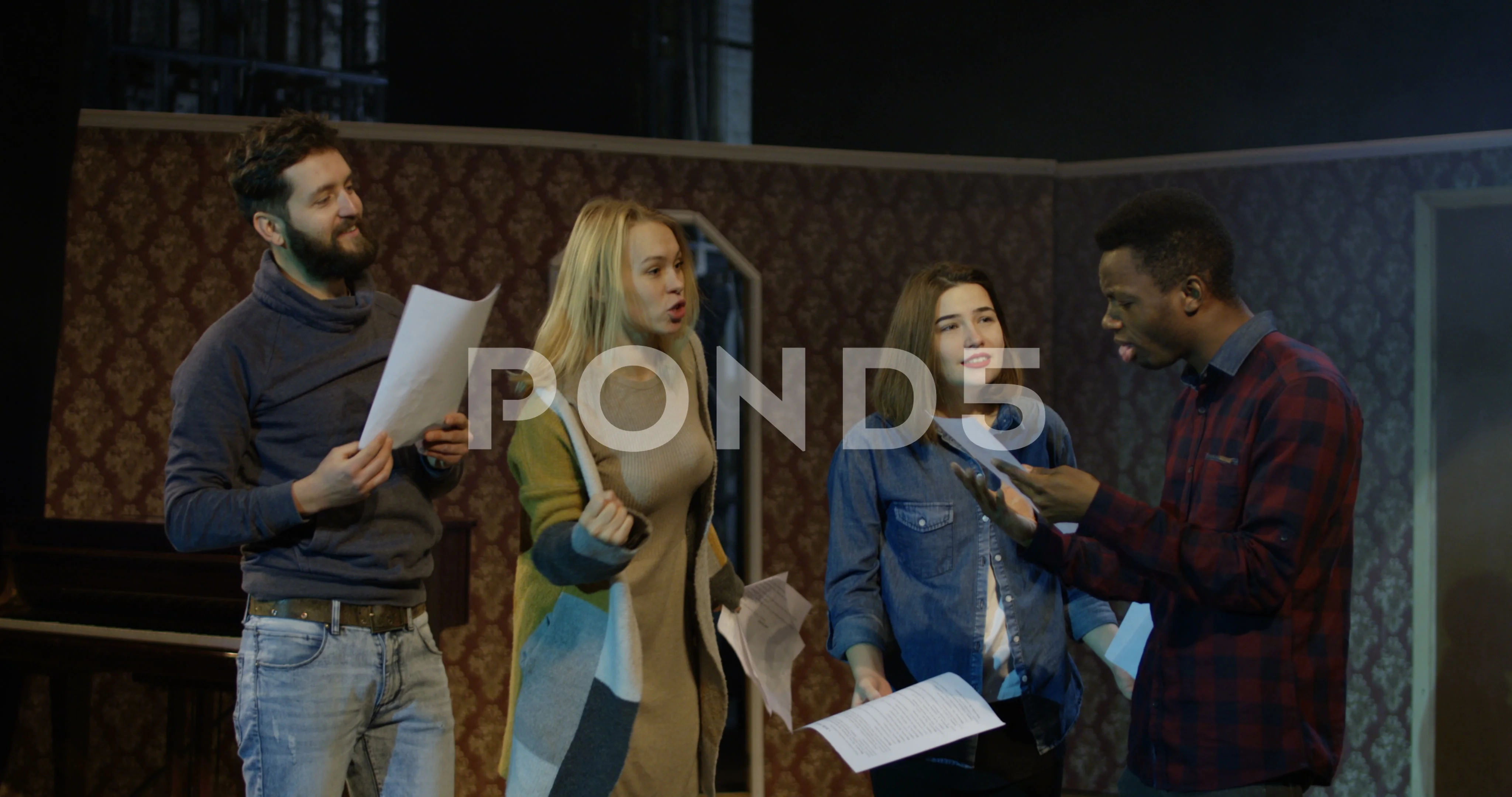 Actors arguing during rehearsal in a theater